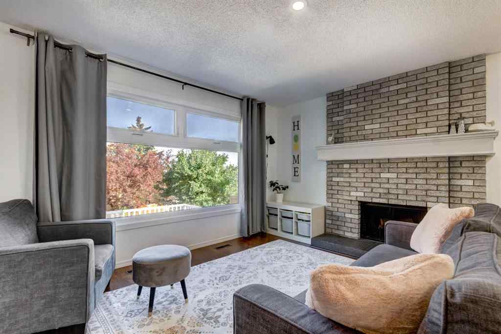 MLS® A2269029 - 235 Strathearn Crescent SW in Strathcona Park Calgary, Residential