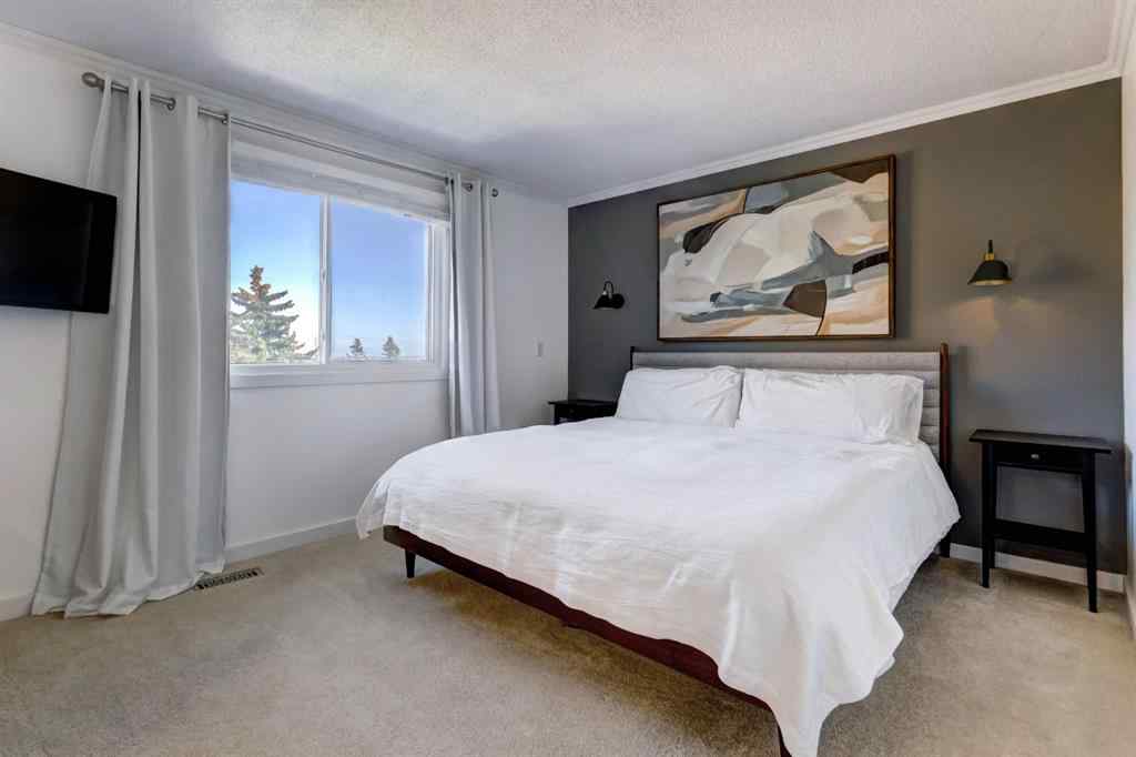 MLS® A2269029 - 235 Strathearn Crescent SW in Strathcona Park Calgary, Residential