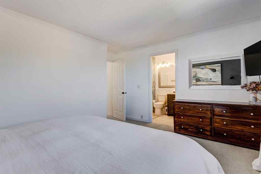 MLS® A2269029 - 235 Strathearn Crescent SW in Strathcona Park Calgary, Residential