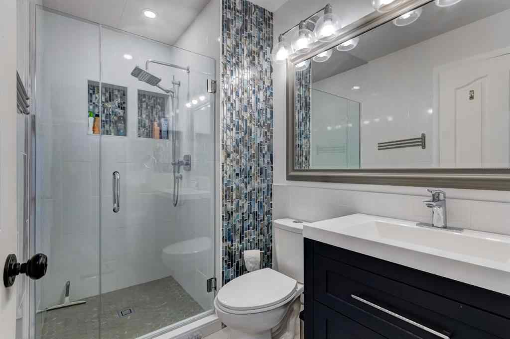 MLS® A2269029 - 235 Strathearn Crescent SW in Strathcona Park Calgary, Residential