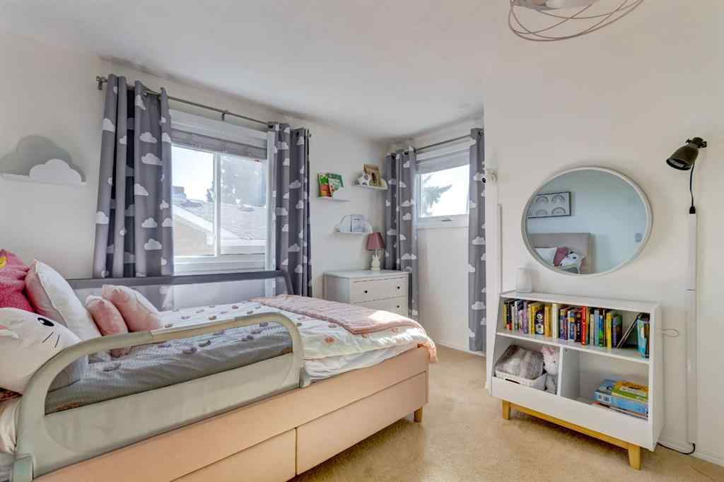 MLS® A2269029 - 235 Strathearn Crescent SW in Strathcona Park Calgary, Residential