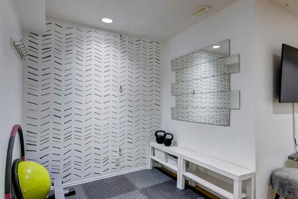 MLS® A2269029 - 235 Strathearn Crescent SW in Strathcona Park Calgary, Residential