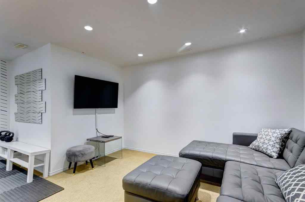 MLS® A2269029 - 235 Strathearn Crescent SW in Strathcona Park Calgary, Residential