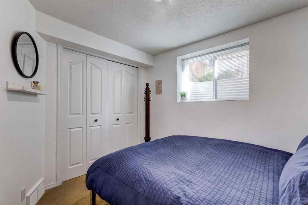 MLS® A2269029 - 235 Strathearn Crescent SW in Strathcona Park Calgary, Residential