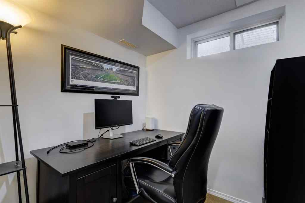 MLS® A2269029 - 235 Strathearn Crescent SW in Strathcona Park Calgary, Residential