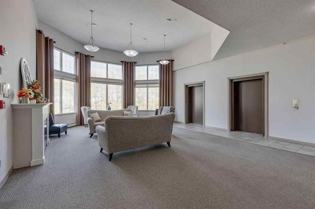 MLS® A2269032 - Unit #205 1 Crystal Green Lane  in Crystal Green Okotoks, Residential