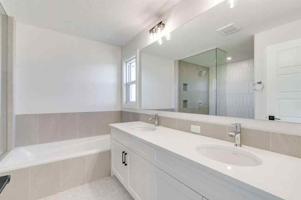 MLS® A2269062 - 306 Hotchkiss Manor SE in Hotchkiss Calgary, Residential