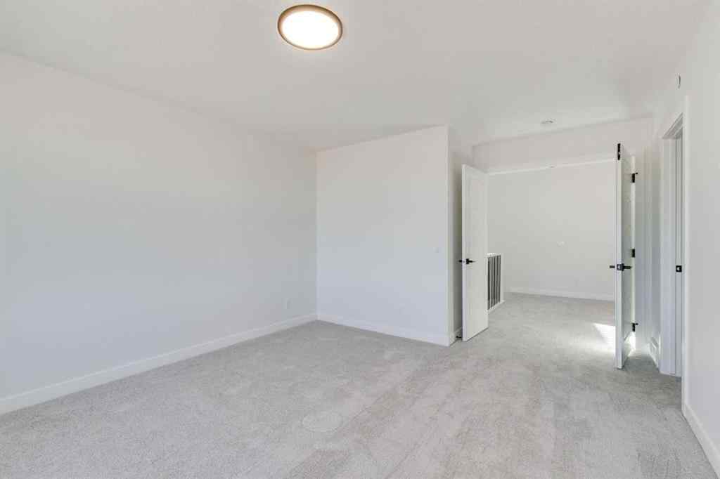 MLS® A2269062 - 306 Hotchkiss Manor SE in Hotchkiss Calgary, Residential