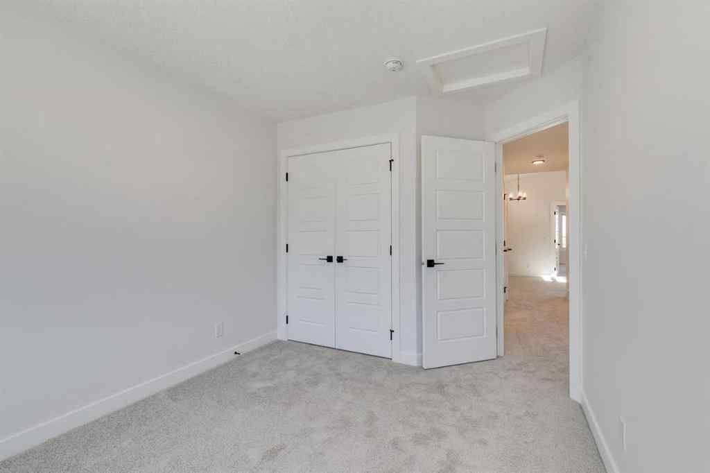 MLS® A2269062 - 306 Hotchkiss Manor SE in Hotchkiss Calgary, Residential