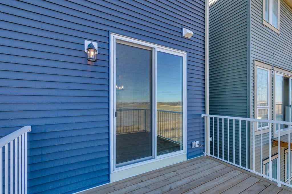 MLS® A2269062 - 306 Hotchkiss Manor SE in Hotchkiss Calgary, Residential