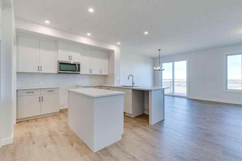 MLS® A2269062 - 306 Hotchkiss Manor SE in Hotchkiss Calgary, Residential