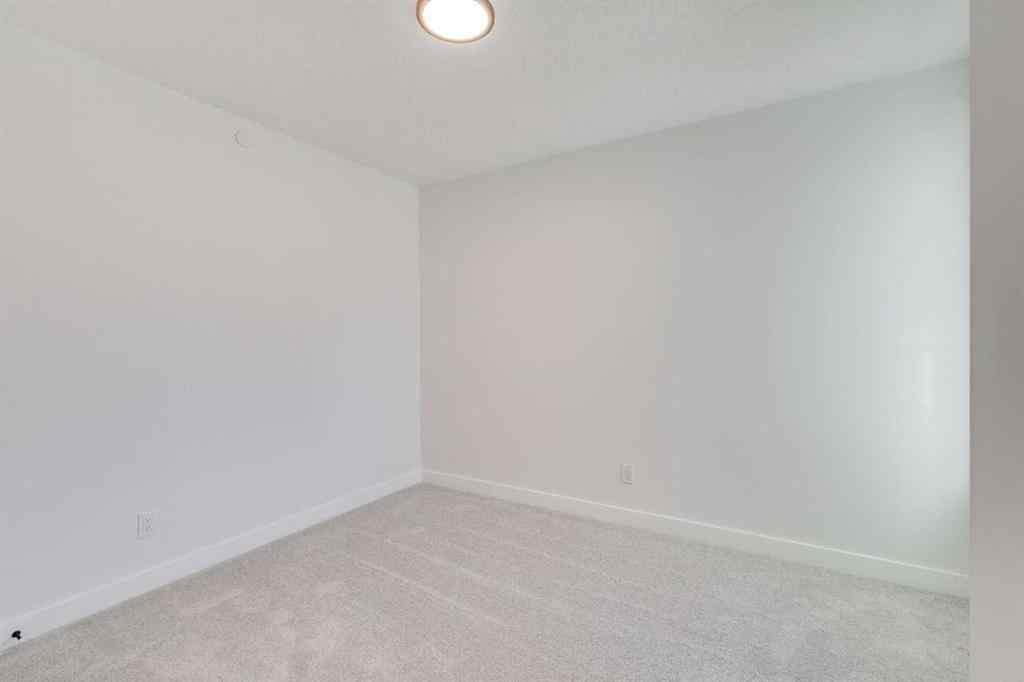 MLS® A2269062 - 306 Hotchkiss Manor SE in Hotchkiss Calgary, Residential