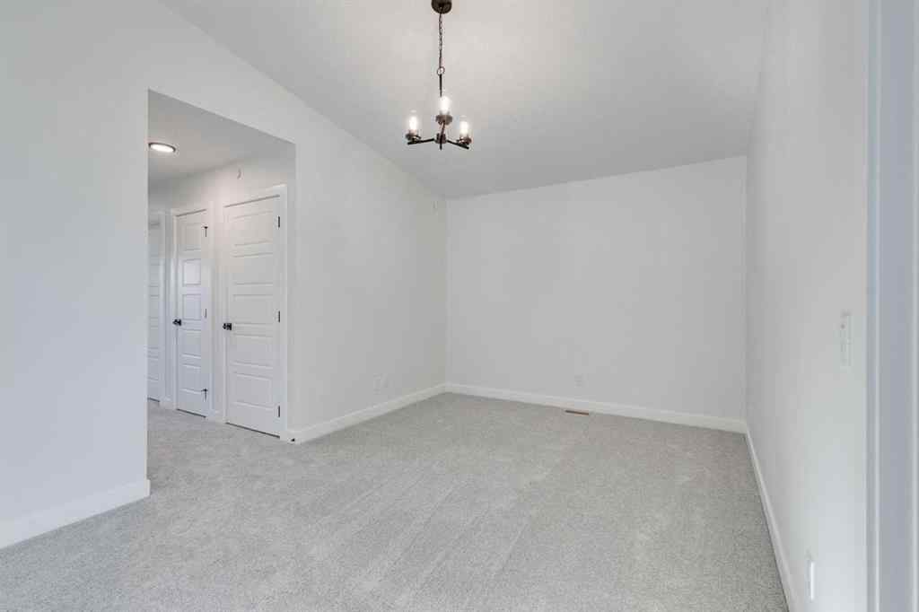 MLS® A2269062 - 306 Hotchkiss Manor SE in Hotchkiss Calgary, Residential