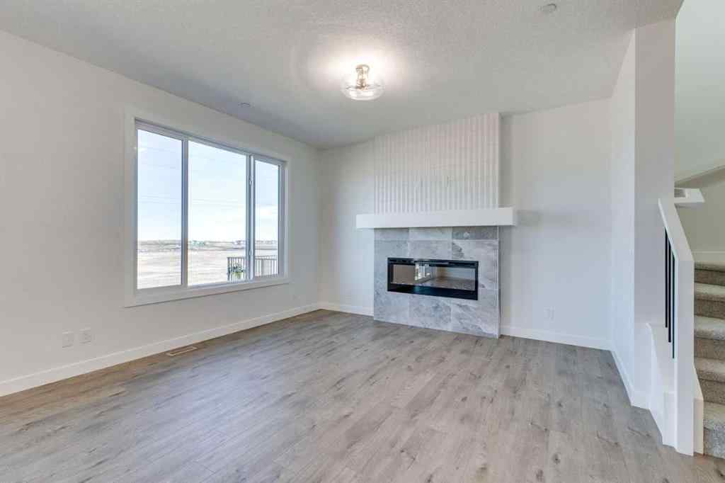 MLS® A2269062 - 306 Hotchkiss Manor SE in Hotchkiss Calgary, Residential