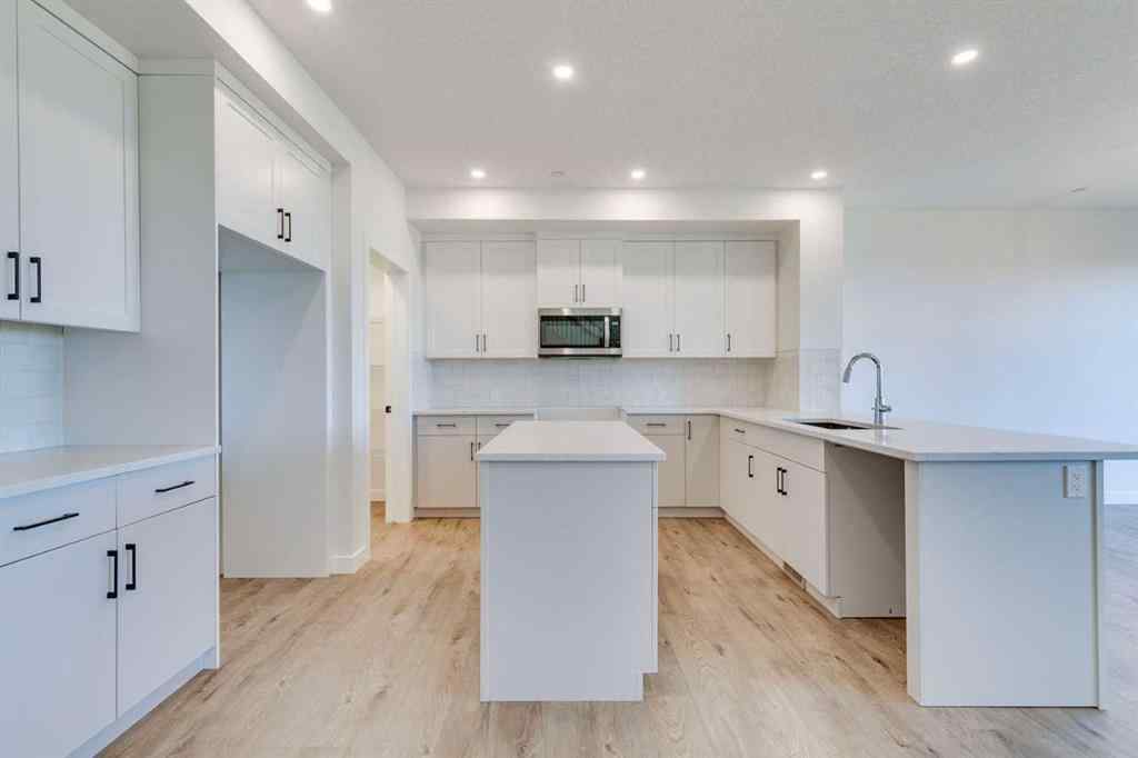 MLS® A2269062 - 306 Hotchkiss Manor SE in Hotchkiss Calgary, Residential