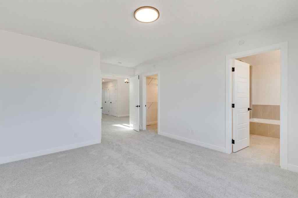 MLS® A2269062 - 306 Hotchkiss Manor SE in Hotchkiss Calgary, Residential