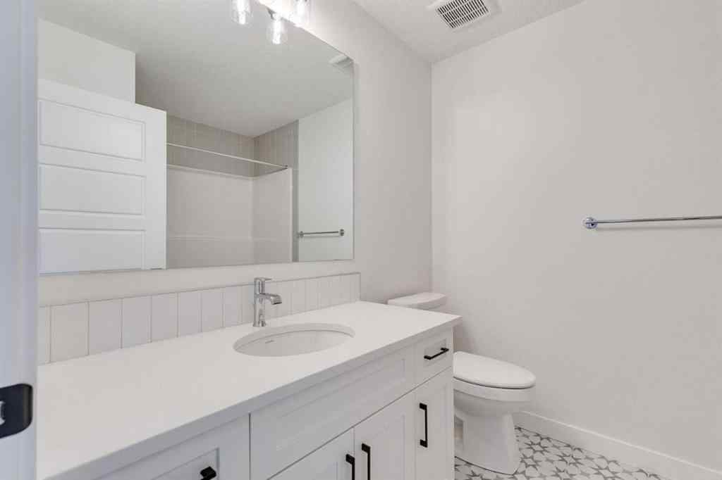 MLS® A2269062 - 306 Hotchkiss Manor SE in Hotchkiss Calgary, Residential