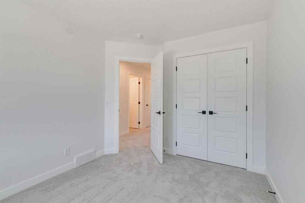 MLS® A2269062 - 306 Hotchkiss Manor SE in Hotchkiss Calgary, Residential