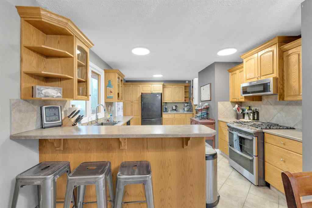 MLS&reg; # A2269082 - 5228 38 Street Crescent  in Margodt Innisfail, Residential Open Houses