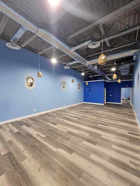 MLS&reg; # A2269093 - Unit #110 4623 Bowness Road NW in Montgomery Calgary, Commercial Open Houses