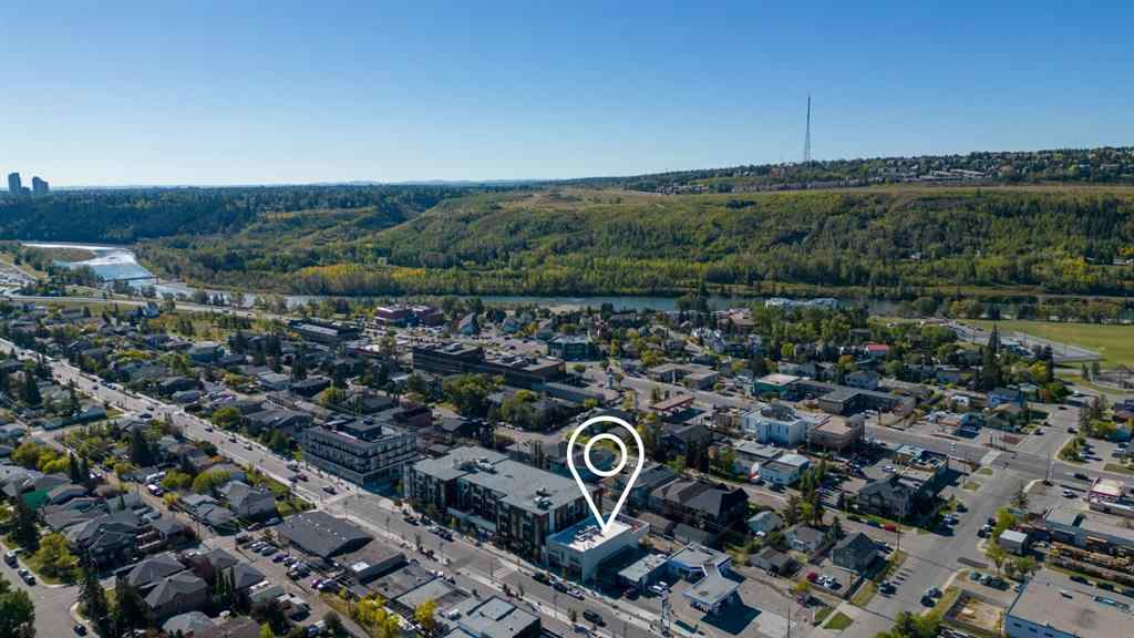 MLS&reg; # A2269093 - Unit #110 4623 Bowness Road NW in Montgomery Calgary, Commercial Open Houses