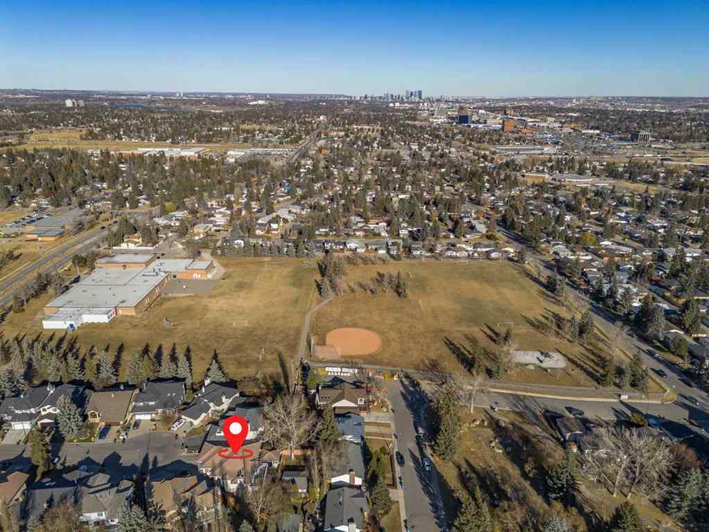 MLS® A2269104 - 127 Canterbury Court SW in Canyon Meadows Calgary, Residential