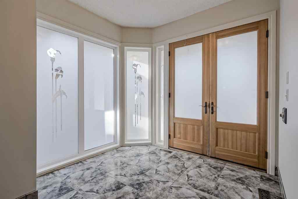 MLS® A2269104 - 127 Canterbury Court SW in Canyon Meadows Calgary, Residential