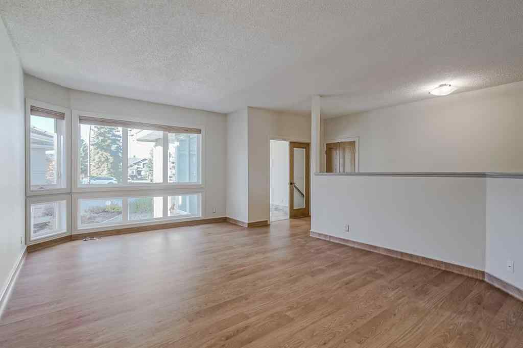 MLS® A2269104 - 127 Canterbury Court SW in Canyon Meadows Calgary, Residential
