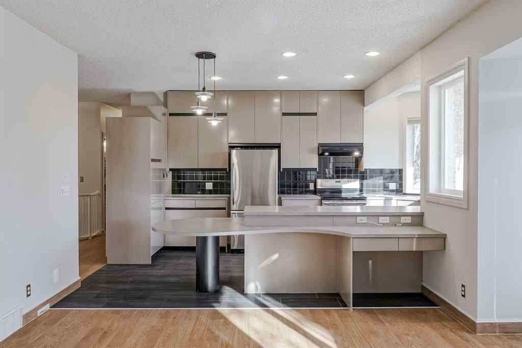 MLS® A2269104 - 127 Canterbury Court SW in Canyon Meadows Calgary, Residential