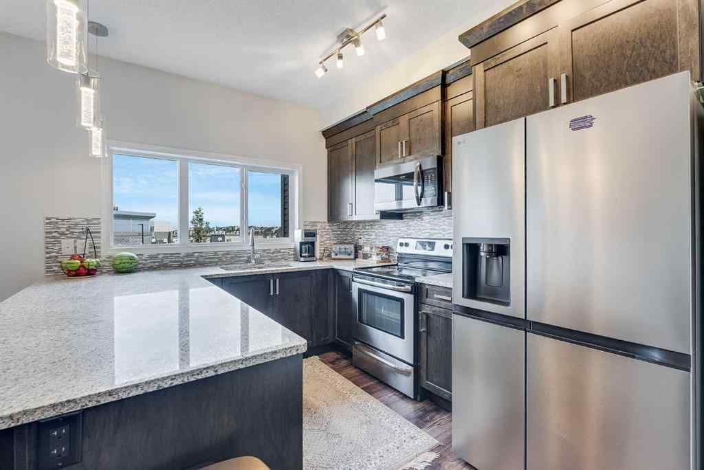 MLS® A2269109 - 665 Hillcrest Road SW in Hillcrest Airdrie, Residential