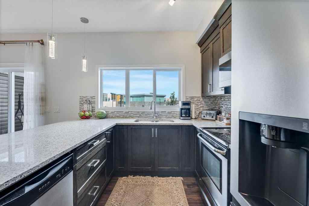 MLS® A2269109 - 665 Hillcrest Road SW in Hillcrest Airdrie, Residential