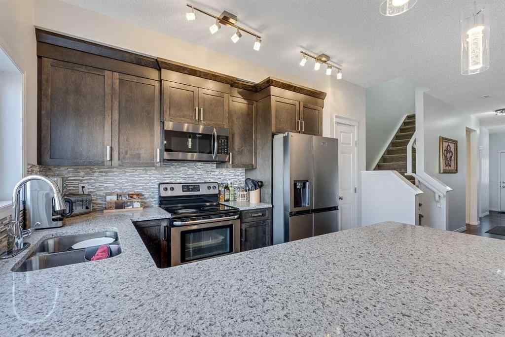 MLS® A2269109 - 665 Hillcrest Road SW in Hillcrest Airdrie, Residential
