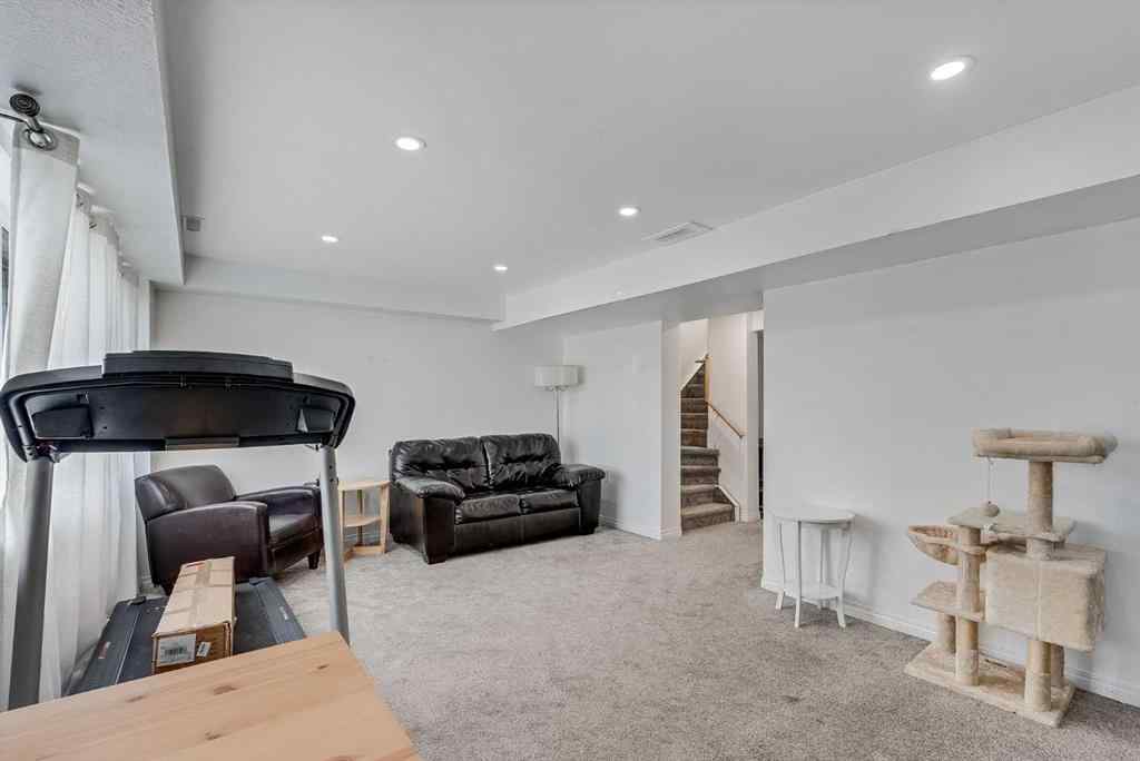 MLS® A2269109 - 665 Hillcrest Road SW in Hillcrest Airdrie, Residential