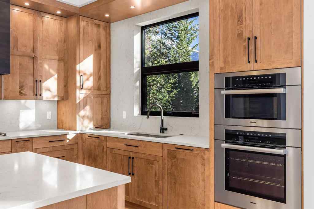 MLS® A2269131 - 28 Blue Grouse Ridge  in Silvertip Canmore, Residential