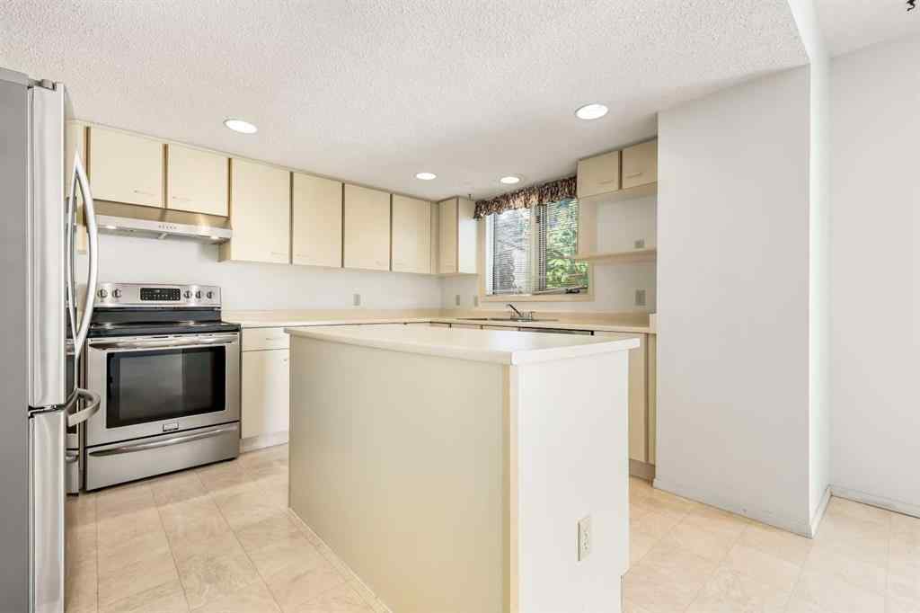 MLS® A2269133 - Unit #77 5810 Patina Drive SW in Patterson Calgary, Residential