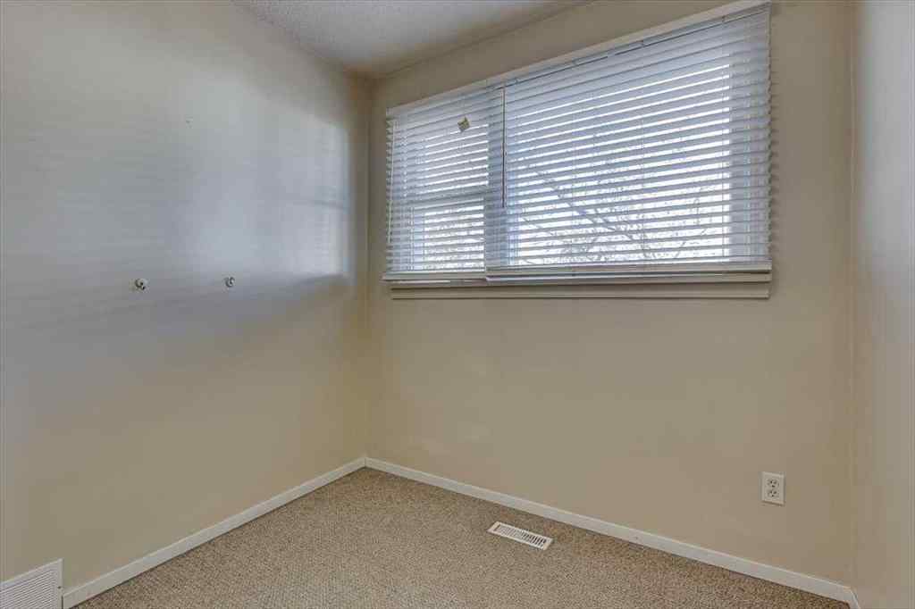 MLS® A2269138 - 5218 56 Avenue  in Central Ponoka Ponoka, Multi-Family