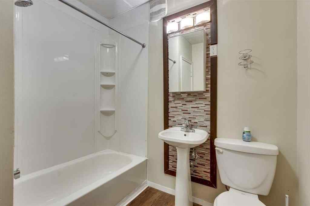 MLS® A2269138 - 5218 56 Avenue  in Central Ponoka Ponoka, Multi-Family