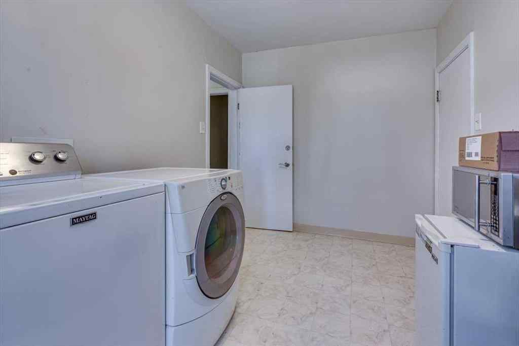 MLS® A2269138 - 5218 56 Avenue  in Central Ponoka Ponoka, Multi-Family