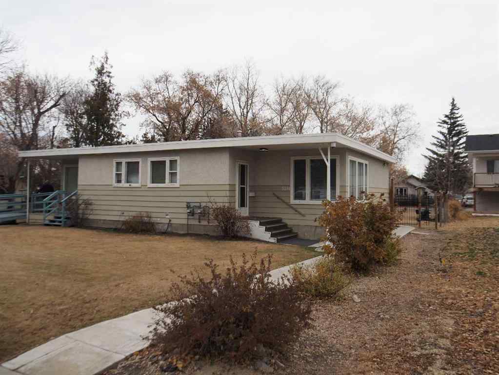 MLS® A2269138 - 5218 56 Avenue  in Central Ponoka Ponoka, Multi-Family