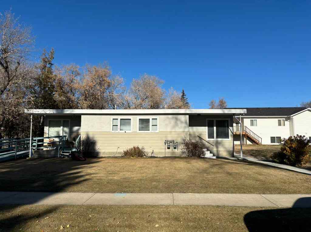 MLS® A2269138 - 5218 56 Avenue  in Central Ponoka Ponoka, Multi-Family