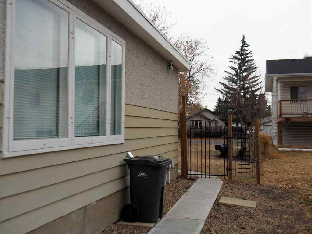 MLS® A2269138 - 5218 56 Avenue  in Central Ponoka Ponoka, Multi-Family