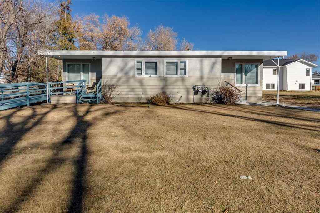 MLS® A2269138 - 5218 56 Avenue  in Central Ponoka Ponoka, Multi-Family