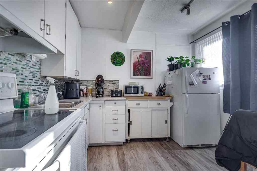 MLS® A2269138 - 5218 56 Avenue  in Central Ponoka Ponoka, Multi-Family