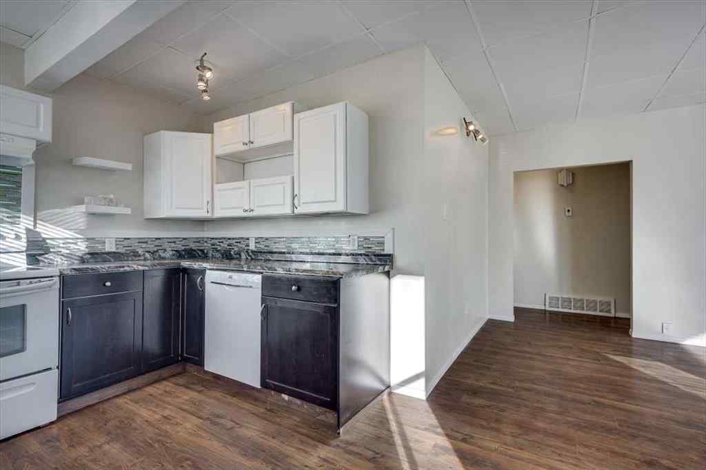 MLS® A2269138 - 5218 56 Avenue  in Central Ponoka Ponoka, Multi-Family