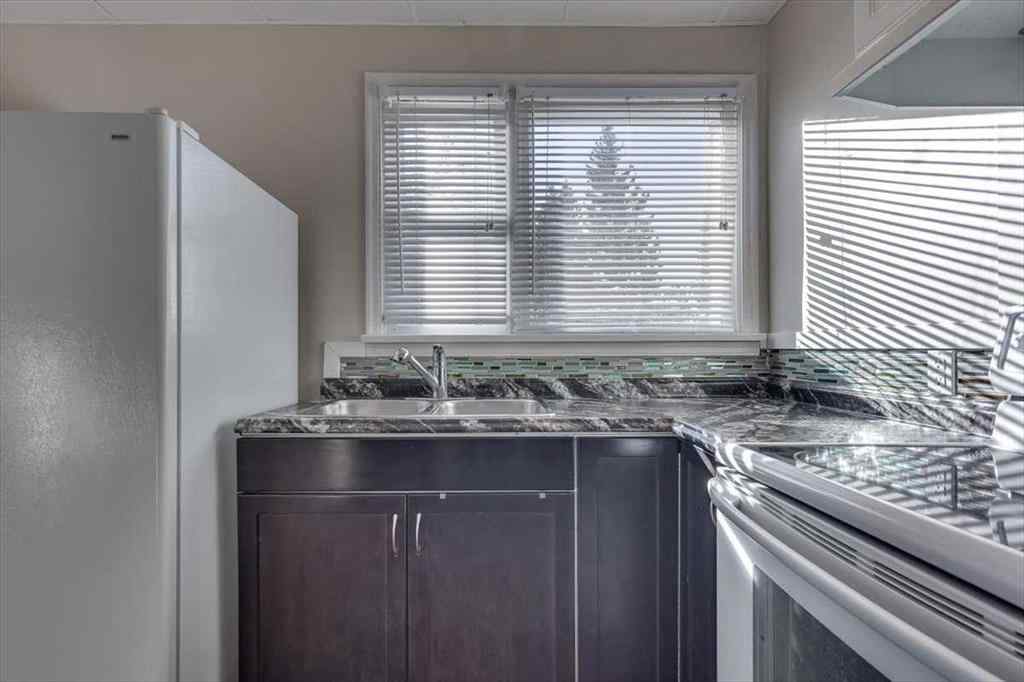 MLS® A2269138 - 5218 56 Avenue  in Central Ponoka Ponoka, Multi-Family