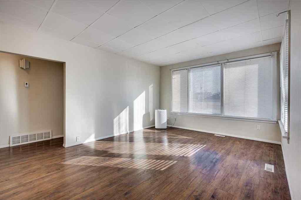 MLS® A2269138 - 5218 56 Avenue  in Central Ponoka Ponoka, Multi-Family