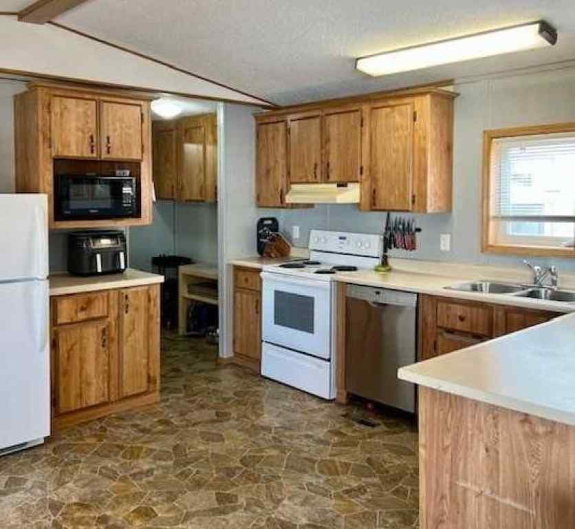 MLS® A2269139 - Unit #45 134 Village Way  in Westpark Village Strathmore, Mobile