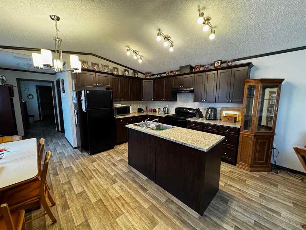 MLS&reg; # A2269170 - 84 Greenwood Villa   in Newcastle Drumheller, Mobile Open Houses