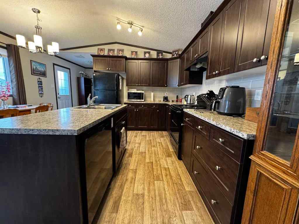 MLS&reg; # A2269170 - 84 Greenwood Villa   in Newcastle Drumheller, Mobile Open Houses