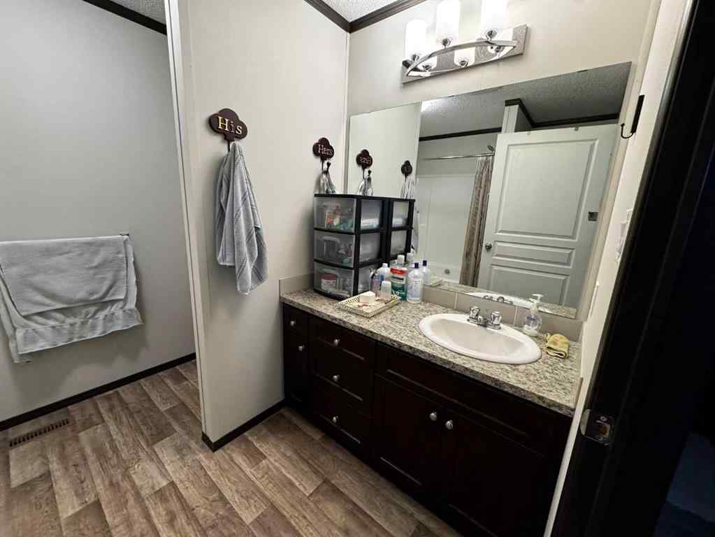 MLS&reg; # A2269170 - 84 Greenwood Villa   in Newcastle Drumheller, Mobile Open Houses